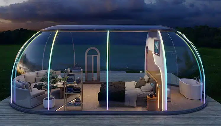 Romantic couple glamping under warm lights